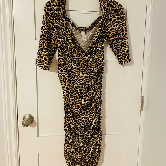 Plus - 1X Bodycon Cheetah Print Dress. 96% polyester/4% spandex - Picture 2 of 2